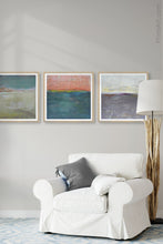 Load image into Gallery viewer, Modern abstract ocean art &quot;Hidden Sun,&quot; wall art print by Victoria Primicias, decorates the living room.
