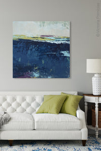 Indigo abstract beach wall decor "Indigo Blue," wall art print by Victoria Primicias, decorates the living room.
