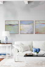 Load image into Gallery viewer, Yellow and gray abstract beach artwork &quot;Inner Ocean,&quot; fine art print by Victoria Primicias, decorates the living room.
