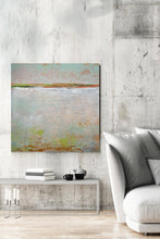Load image into Gallery viewer, Neutral color abstract ocean painting &quot;Ivory Shore,&quot; digital print by Victoria Primicias, decorates the living room.
