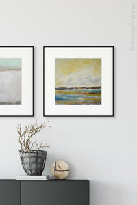 Coastal abstract landscape painting "Lapping Layers," digital download by Victoria Primicias, decorates the foyer.