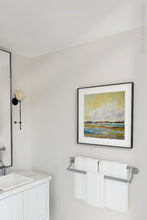Load image into Gallery viewer, Coastal landscape painting &quot;Lapping Layers,&quot; digital download by Victoria Primicias, decorates the bathroom.
