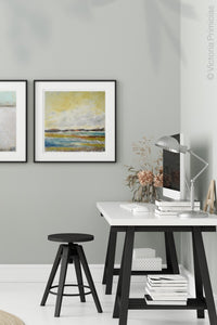 Yellow coastal abstract ocean painting "Lapping Layers," canvas wall art by Victoria Primicias, decorates the bathroom.
