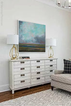 Load image into Gallery viewer, Square abstract landscape art &quot;Last Soiree,&quot; printable wall art by Victoria Primicias, decorates the living room.
