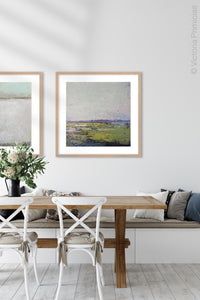 Square abstract landscape painting "Manana Margarita," canvas wall art by Victoria Primicias, decorates the dining room.