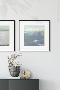 Gray abstract seascape painting "Marthas Shallows," wall art print by Victoria Primicias, decorates the entryway.