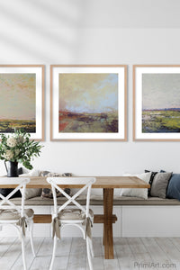 Modern abstract beach artwork "Martini Morning," printable wall art by Victoria Primicias, decorates the dining room.