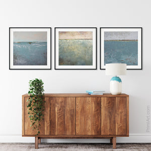 Teal abstract ocean painting "Merchant Crossing," printable wall art by Victoria Primicias, decorates the entryway.