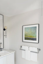 Load image into Gallery viewer, Chartreuse abstract beach artwork &quot;Merchant Skies,&quot; digital artwork by Victoria Primicias, decorates the bathroom.
