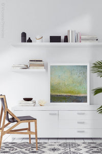 Chartreuse abstract ocean wall art "Merchant Skies," digital download by Victoria Primicias, decorates the office.