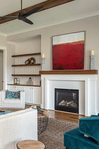 Bold abstract coastal wall decor "Merlot Passage," printable wall art by Victoria Primicias, decorates the fireplace.