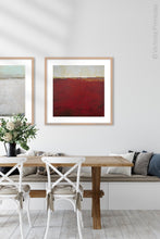 Load image into Gallery viewer, Red abstract ocean wall art &quot;Merlot Passage,&quot; canvas print by Victoria Primicias, decorates the dining room.
