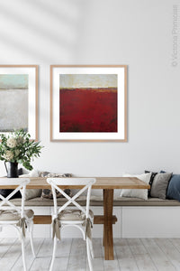 Red abstract ocean wall art "Merlot Passage," canvas print by Victoria Primicias, decorates the dining room.
