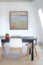 Load image into Gallery viewer, Contemporary beige abstract ocean painting &quot;Migrant Shores,&quot; digital print by Victoria Primicias, decorates the office.
