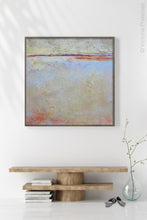 Load image into Gallery viewer, Contemporary coastal abstract beach painting &quot;Migrant Shores,&quot; canvas print by Victoria Primicias, decorates the entryway.
