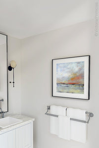 Modern landscape painting "Missing Stream," printable wall art by Victoria Primicias, decorates the bathroom.