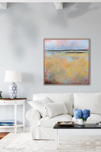 Coastal abstract ocean wall art "Morning Gallery," digital print by Victoria Primicias, decorates the living room.