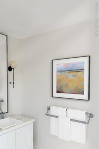 Coastal abstract landscape painting "Morning Gallery," downloadable art by Victoria Primicias, decorates the bathroom.