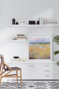 Yellow abstract ocean wall art "Morning Gallery," metal print by Victoria Primicias, decorates the office.
