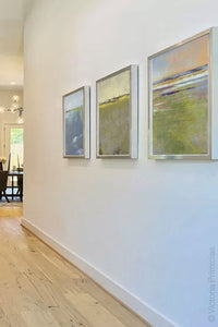 Horizon abstract landscape art "Novel Sheets," digital art landscape by Victoria Primicias, decorates the hallway.