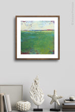 Load image into Gallery viewer, Green abstract landscape painting &quot;On Course,&quot; digital print by Victoria Primicias, decorates the wall.
