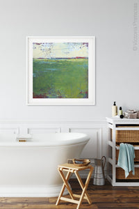 Green abstract landscape art "On Course," digital print by Victoria Primicias, decorates the bathroom.