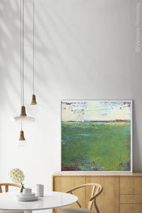 Green abstract landscape painting "On Course," fine art print by Victoria Primicias, decorates the dining room.