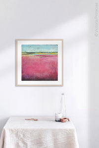 Pink abstract beach artwork "Painted Lady," giclee print by Victoria Primicias, decorates the kitchen.