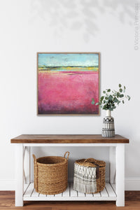Pink abstract beach artwork "Painted Lady," giclee print by Victoria Primicias, decorates the entryway.