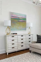Load image into Gallery viewer, Unique abstract coastal wall art &quot;Pastel Inlet,&quot; downloadable art by Victoria Primicias, decorates the living room.
