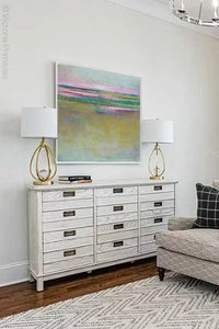 Unique abstract coastal wall art "Pastel Inlet," downloadable art by Victoria Primicias, decorates the living room.