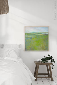 Square contemporary abstract landscape painting "Peridot Pastures," printable wall art by Victoria Primicias, decorates the bedroom.
