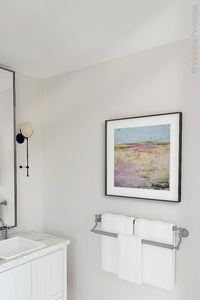 Pink abstract landscape painting "Pink Parade," canvas art print by Victoria Primicias, decorates the bathroom.