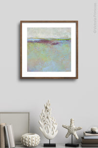 Serene abstract beach painting "Plum Passages," digital download by Victoria Primicias, decorates the wall.