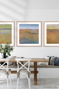 Colorful abstract coastal wall art "Pumpkin Passages," digital download by Victoria Primicias, decorates the dining room.