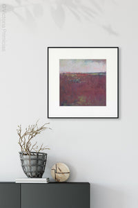 Burgundy abstract beach art "Red Tide," digital print by Victoria Primicias, decorates the entryway.