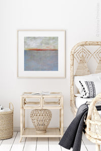 Minimalist abstract ocean painting "Return of Secrets," printable wall art by Victoria Primicias, decorates the bedroom.