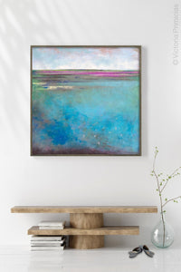 Turquoise abstract beach wall art "Rising Tides," metal print by Victoria Primicias, decorates the hallway.