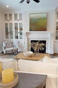 Impressionist abstract landscape art "Silent Spring," downloadable art by Victoria Primicias, decorates the living room.