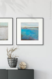 Colorful abstract seascape painting "Silver Sands," digital download by Victoria Primicias, decorates the entryway.