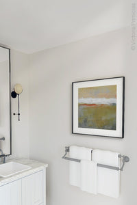 Modern abstract ocean painting "Singing Surf," digital print by Victoria Primicias, decorates the bathroom.