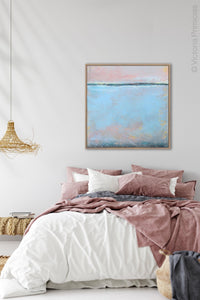 Pastel abstract coastal wall decor "Sister Shore," digital print by Victoria Primicias, decorates the bedroom.