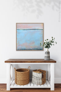 Pastel abstract ocean wall art "Sister Shore," fine art print by Victoria Primicias, decorates the entryway.