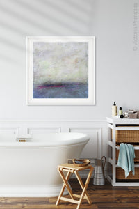 Muted abstract landscape art "Splintered Memory," digital download by Victoria Primicias, decorates the bathroom.