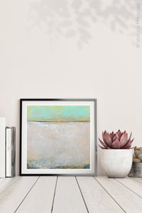 Seafoam and gray abstract beach wall art "Sunday Morning," digital download by Victoria Primicias, decorates the shelf.