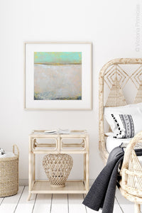 Seafoam and gray abstract beach wall art "Sunday Morning," digital print by Victoria Primicias, decorates the bedroom.