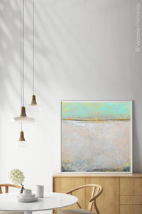 Mint and gray abstract beach wall art "Sunday Morning," metal print by Victoria Primicias, decorates the dining room.