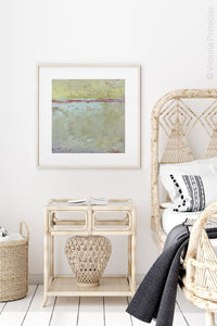 Muted beige abstract ocean painting "Sweet Compass," digital download by Victoria Primicias, decorates the bedroom.
