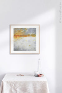 Contemporary abstract ocean painting "Tawny Spirit," digital artwork by Victoria Primicias, decorates the kitchen.