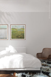 Yellow green abstract landscape painting "Tender Reasons," digital art landscape by Victoria Primicias, decorates the bedroom.